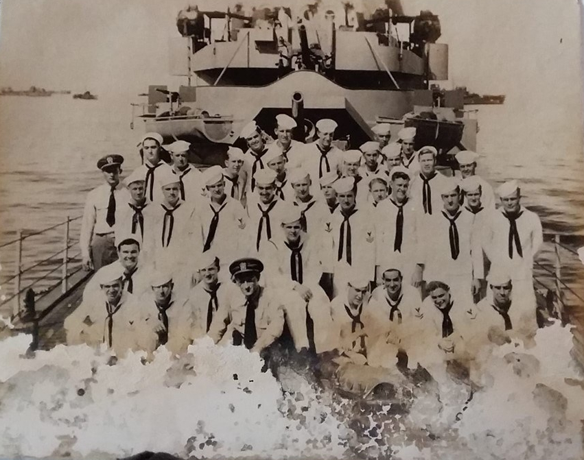 Dad and crew on deck of USS Strickland
